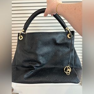 “LV” artsy bag. Perfect condition. All hardware is stamped with LV.